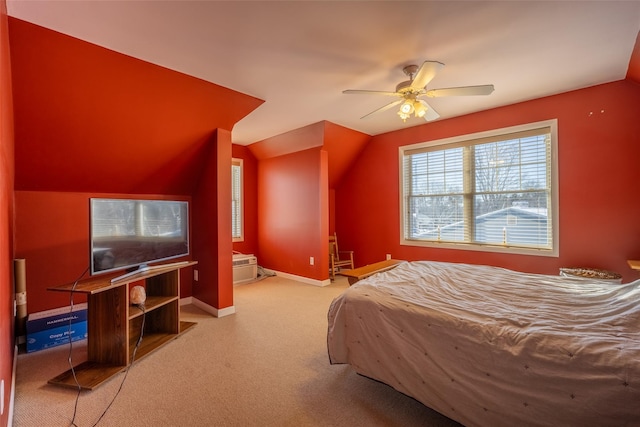 bedroom featuring vaulted ceiling, carpet floors, and ceiling fan