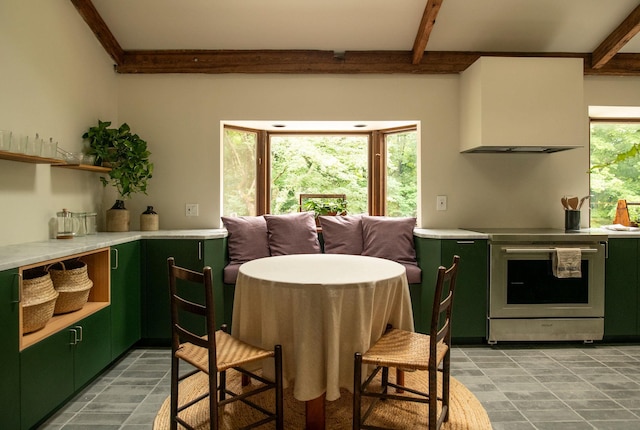 kitchen featuring green cabinets, wall chimney exhaust hood, beam ceiling, and electric stove