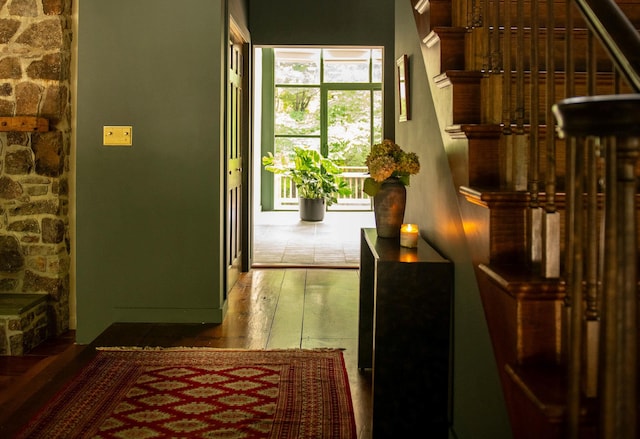 corridor featuring wood-type flooring