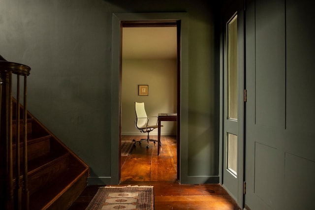 hallway featuring hardwood / wood-style flooring