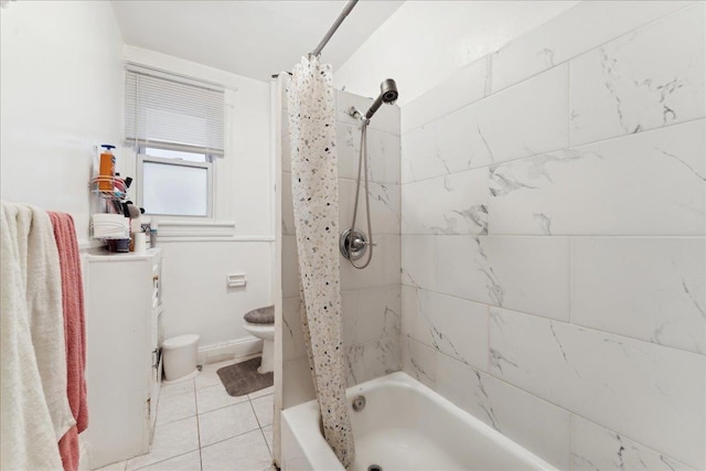 bathroom with tile patterned floors, shower / bath combination with curtain, and toilet