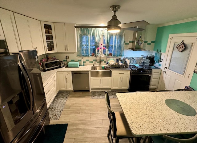 kitchen with dishwasher, sink, white cabinets, fridge with ice dispenser, and black gas range