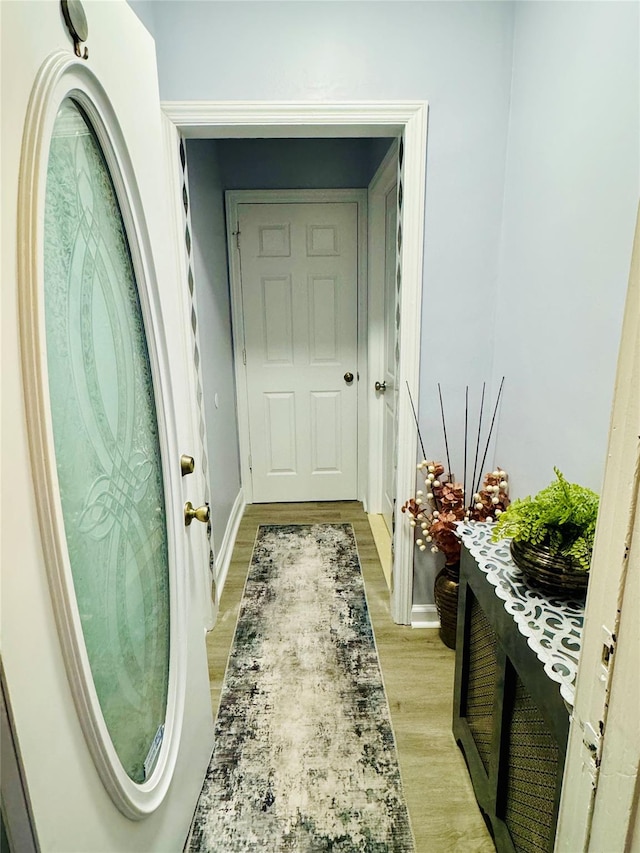 doorway with light hardwood / wood-style floors