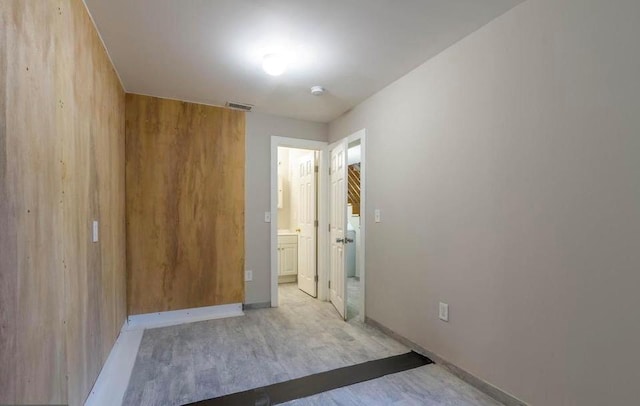 hall featuring light wood-type flooring