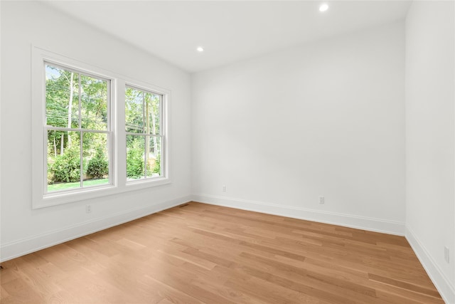 empty room featuring light hardwood / wood-style floors