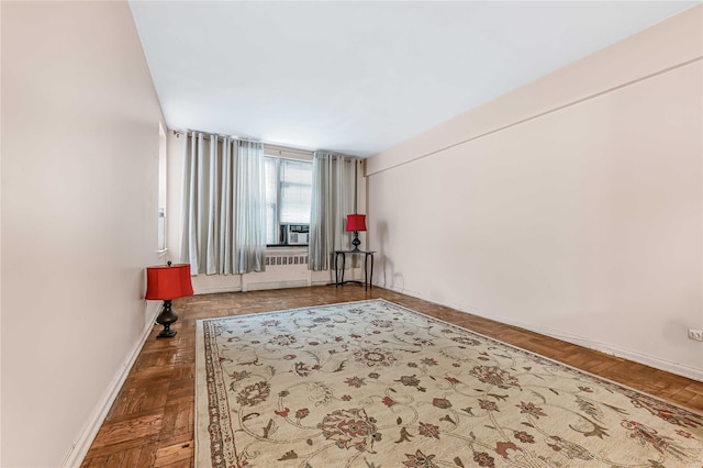 unfurnished room with parquet flooring