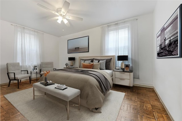 bedroom with parquet flooring and ceiling fan