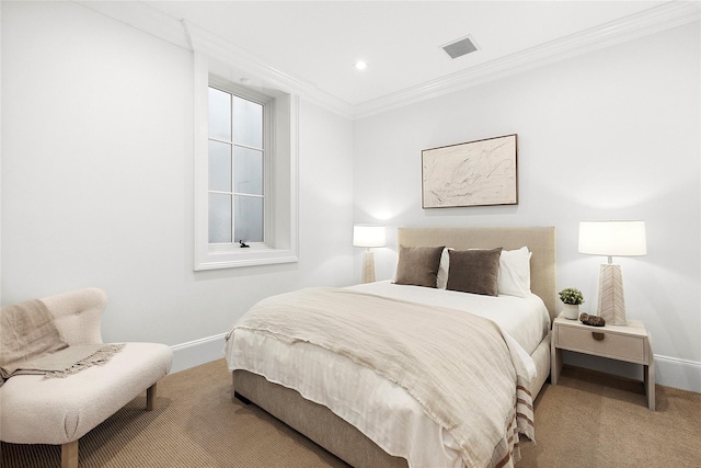 carpeted bedroom featuring crown molding