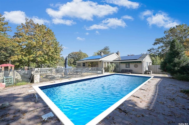 view of pool with a patio