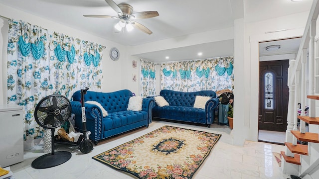 living room featuring ceiling fan