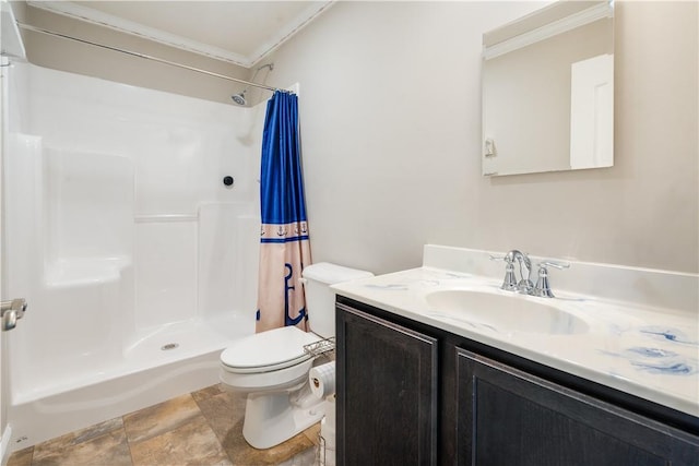 bathroom featuring toilet, vanity, crown molding, and walk in shower