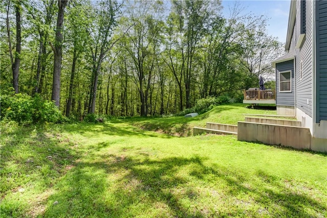 view of yard featuring a deck