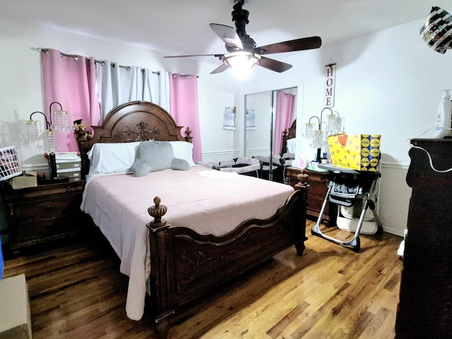 bedroom featuring ceiling fan and wood-type flooring