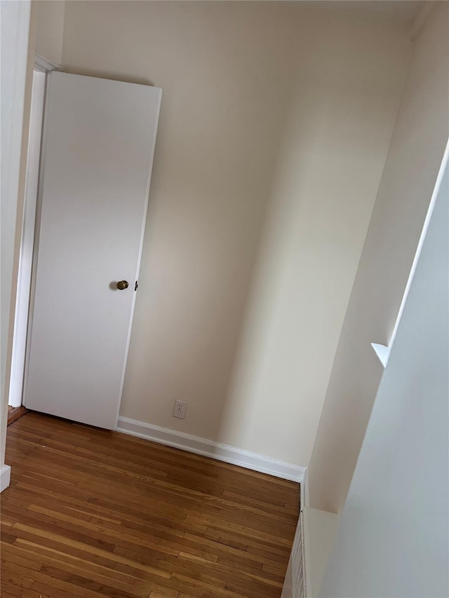 empty room featuring hardwood / wood-style flooring