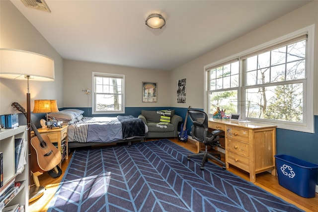 bedroom with wood-type flooring