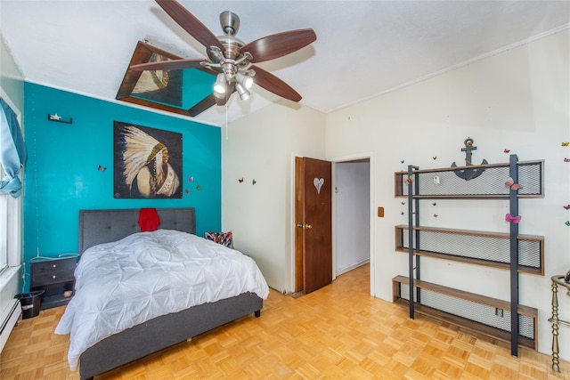 bedroom featuring light parquet floors, a baseboard radiator, and lofted ceiling