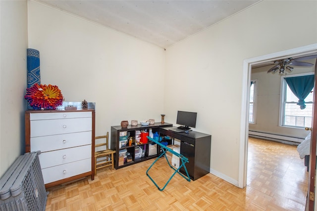 home office featuring light parquet floors, a baseboard radiator, and ceiling fan