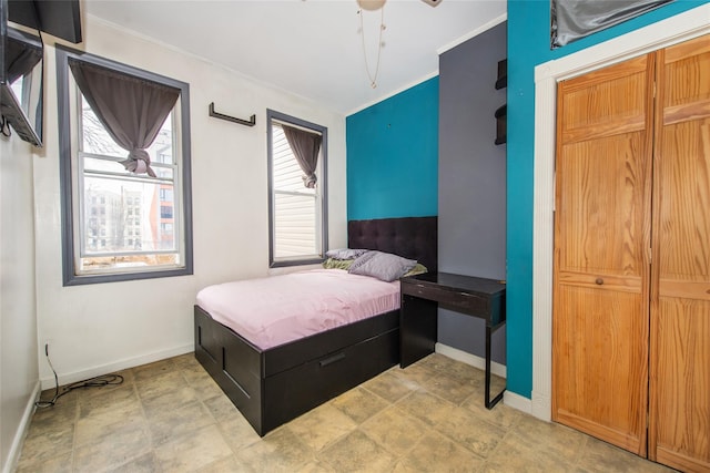 bedroom featuring ornamental molding