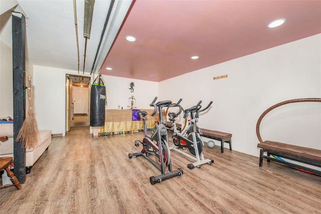 workout room with light wood-type flooring