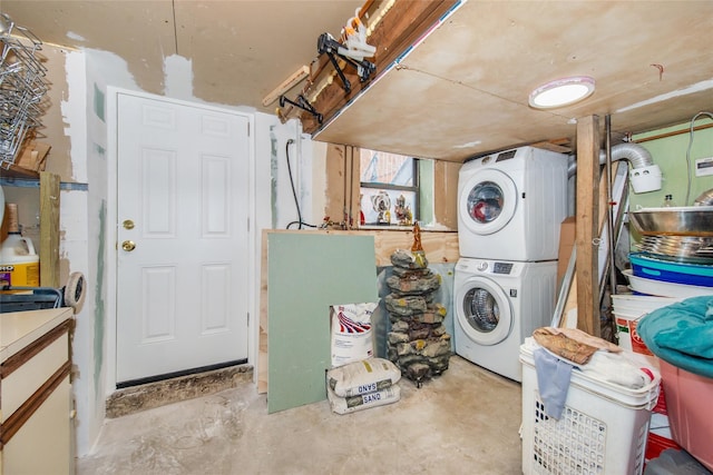 washroom with stacked washer / dryer