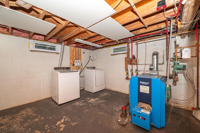 basement with washing machine and clothes dryer