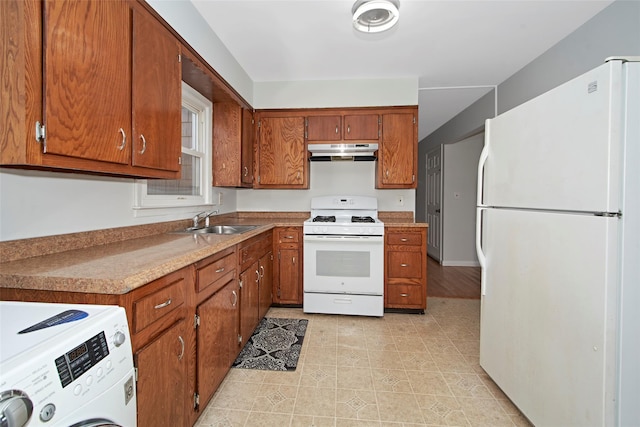 kitchen featuring white appliances, washer / clothes dryer, and sink