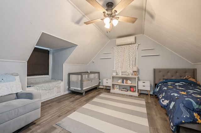 bedroom with hardwood / wood-style flooring, an AC wall unit, lofted ceiling, and ceiling fan