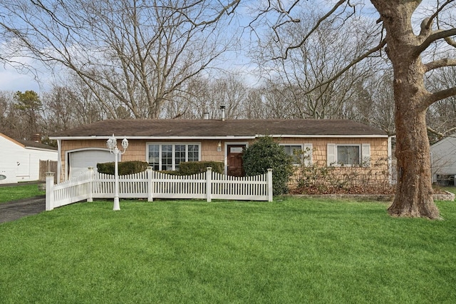 single story home with a garage and a front yard