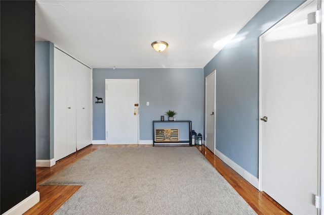 interior space with hardwood / wood-style floors