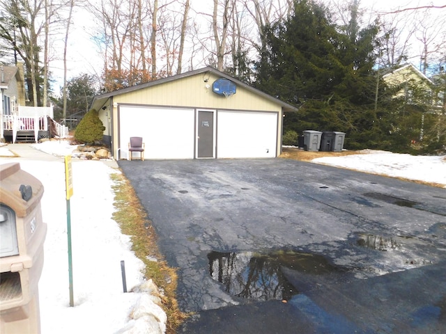 view of snow covered garage