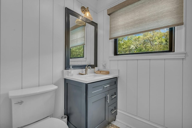 bathroom with vanity and toilet