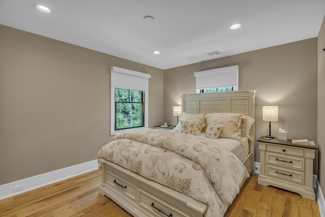 bedroom featuring light wood-type flooring