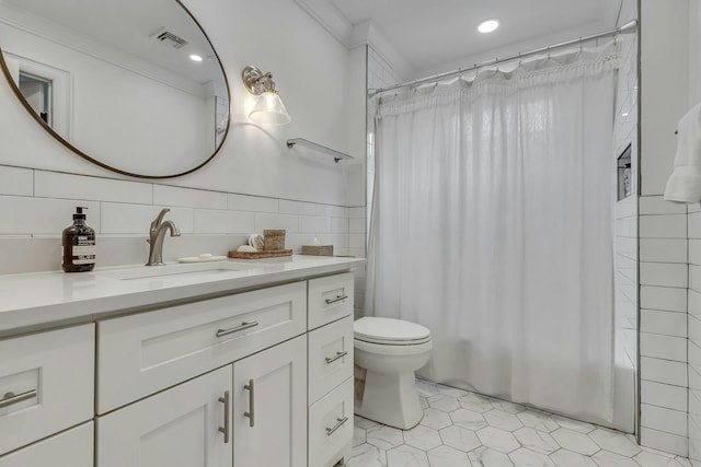 full bathroom with shower / tub combo with curtain, toilet, crown molding, tile walls, and vanity