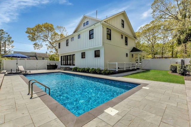 view of swimming pool featuring a patio