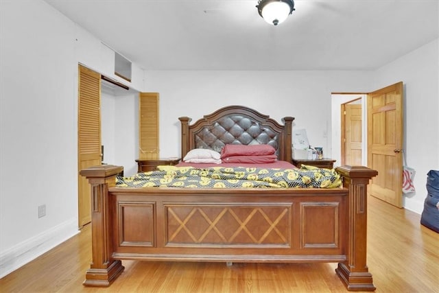 bedroom featuring light hardwood / wood-style floors