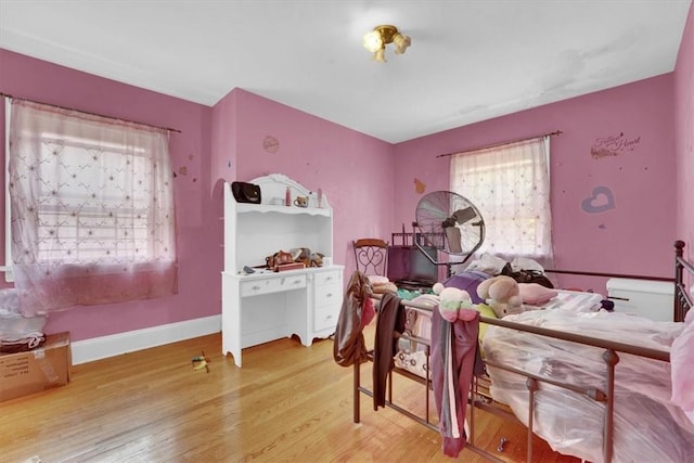 bedroom featuring hardwood / wood-style flooring