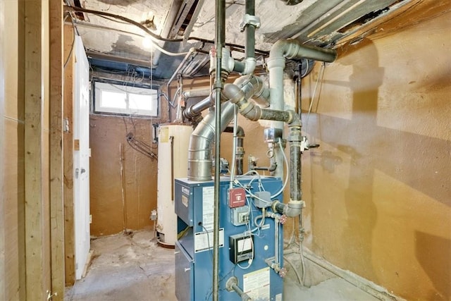 utility room featuring gas water heater