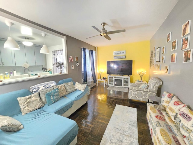 living room with ceiling fan