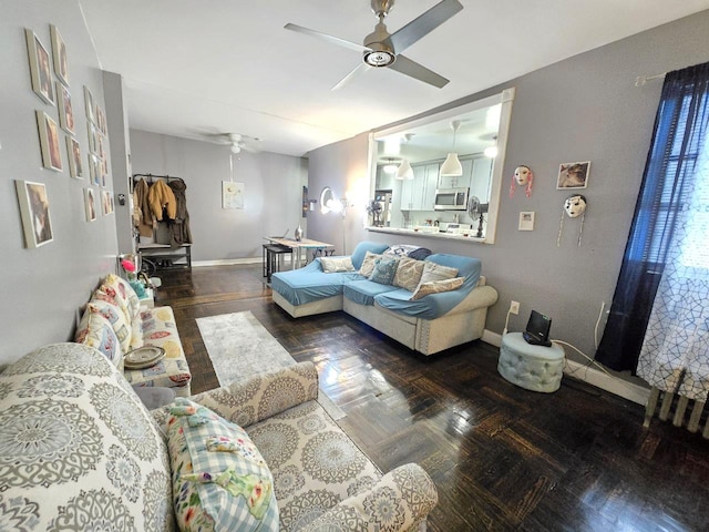 living room with ceiling fan