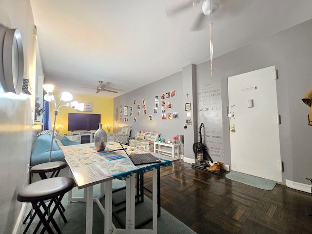 dining area with ceiling fan