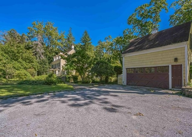 view of home's exterior with a garage