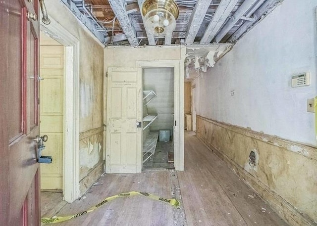 miscellaneous room with wood-type flooring