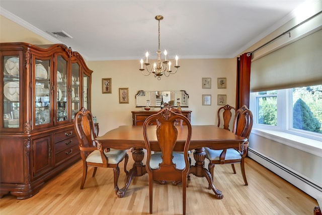 dining space with a notable chandelier, a baseboard radiator, light wood-style flooring, and crown molding