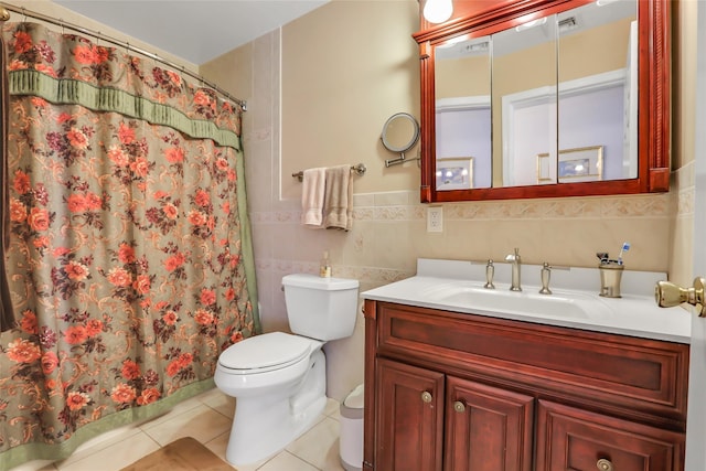 full bath with tile patterned flooring, toilet, a shower with shower curtain, vanity, and tile walls