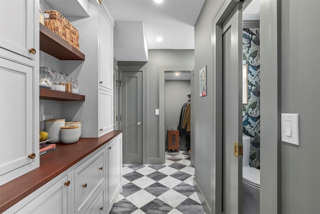 interior space with white cabinetry