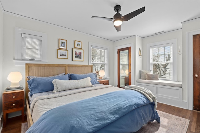 bedroom featuring ceiling fan and dark hardwood / wood-style flooring