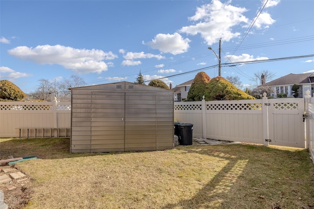 view of outdoor structure featuring a lawn