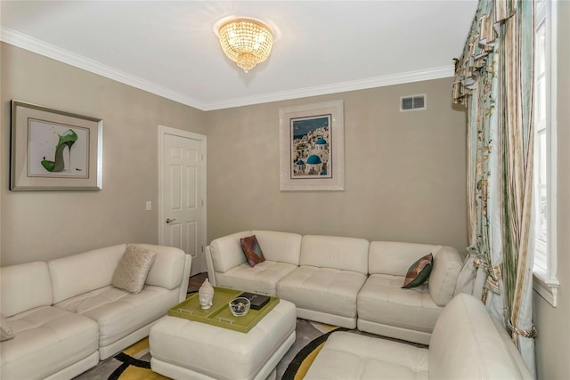 living room featuring ornamental molding and visible vents