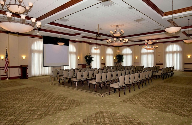 interior space featuring a tray ceiling, ornamental molding, visible vents, and an inviting chandelier