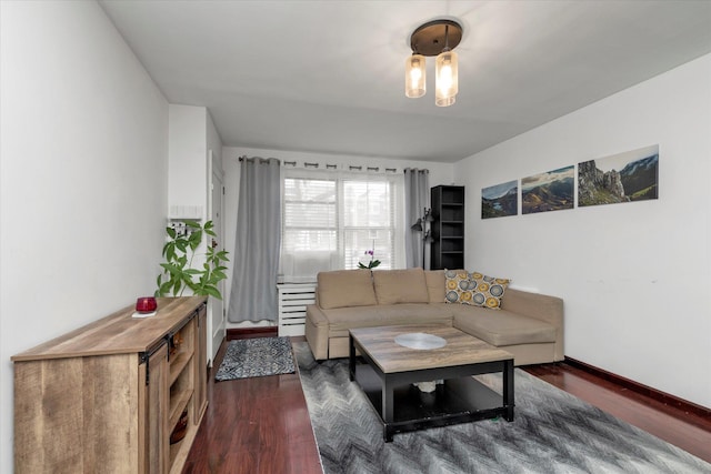 living room featuring dark hardwood / wood-style flooring